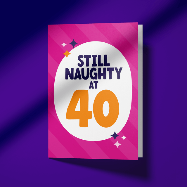 Greeting card with 'Still Naughty at 40' text on a pink background