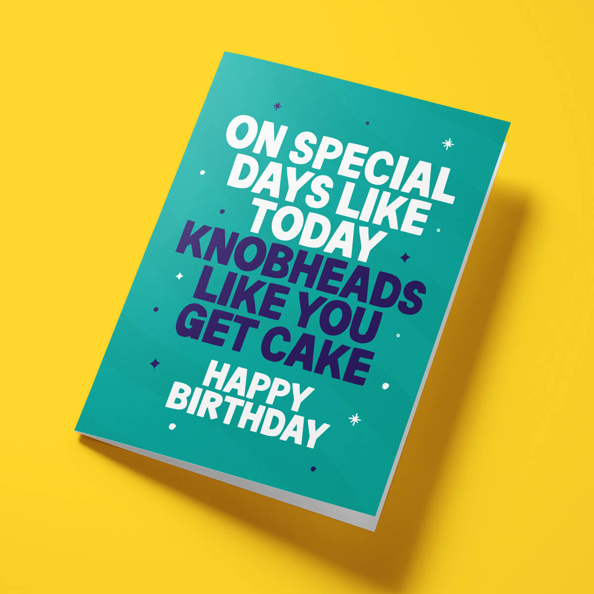Funny birthday card reading 'On Special Days Like Today Knobheads Like You Get Cake Happy Birthday' — teal background, bold white and navy block text — Wottahoot