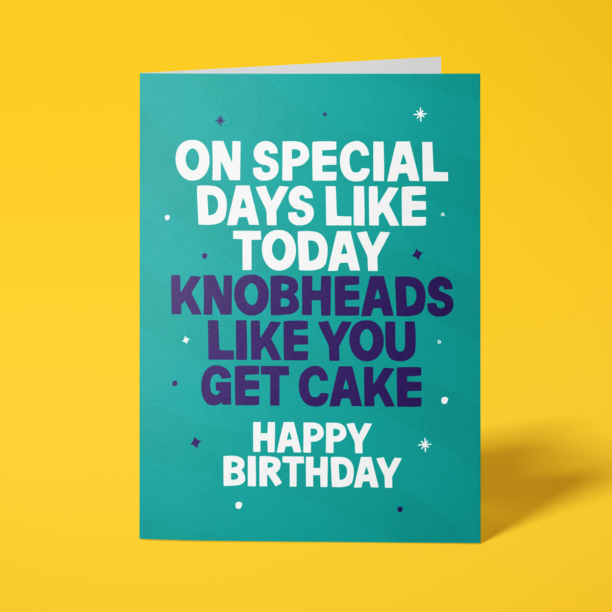 Funny birthday card reading 'On Special Days Like Today Knobheads Like You Get Cake Happy Birthday' — teal background, bold white and navy block text — Wottahoot