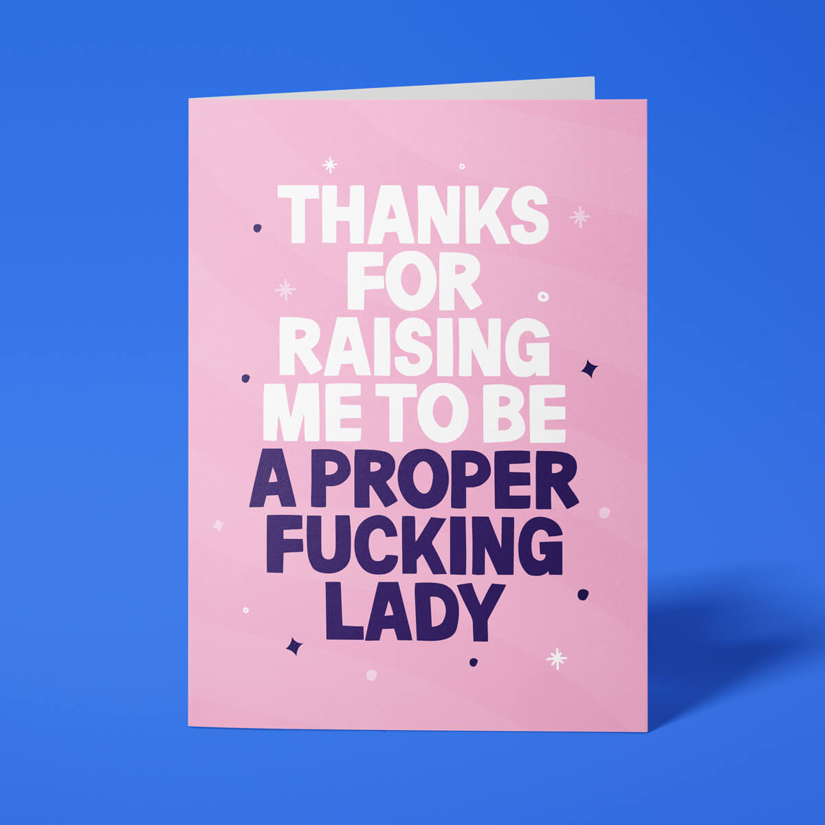 Rude Father's Day card from daughter reading 'Thanks For Raising Me To Be A Proper Fucking Lady' — pink background, bold block text — Wottahoot