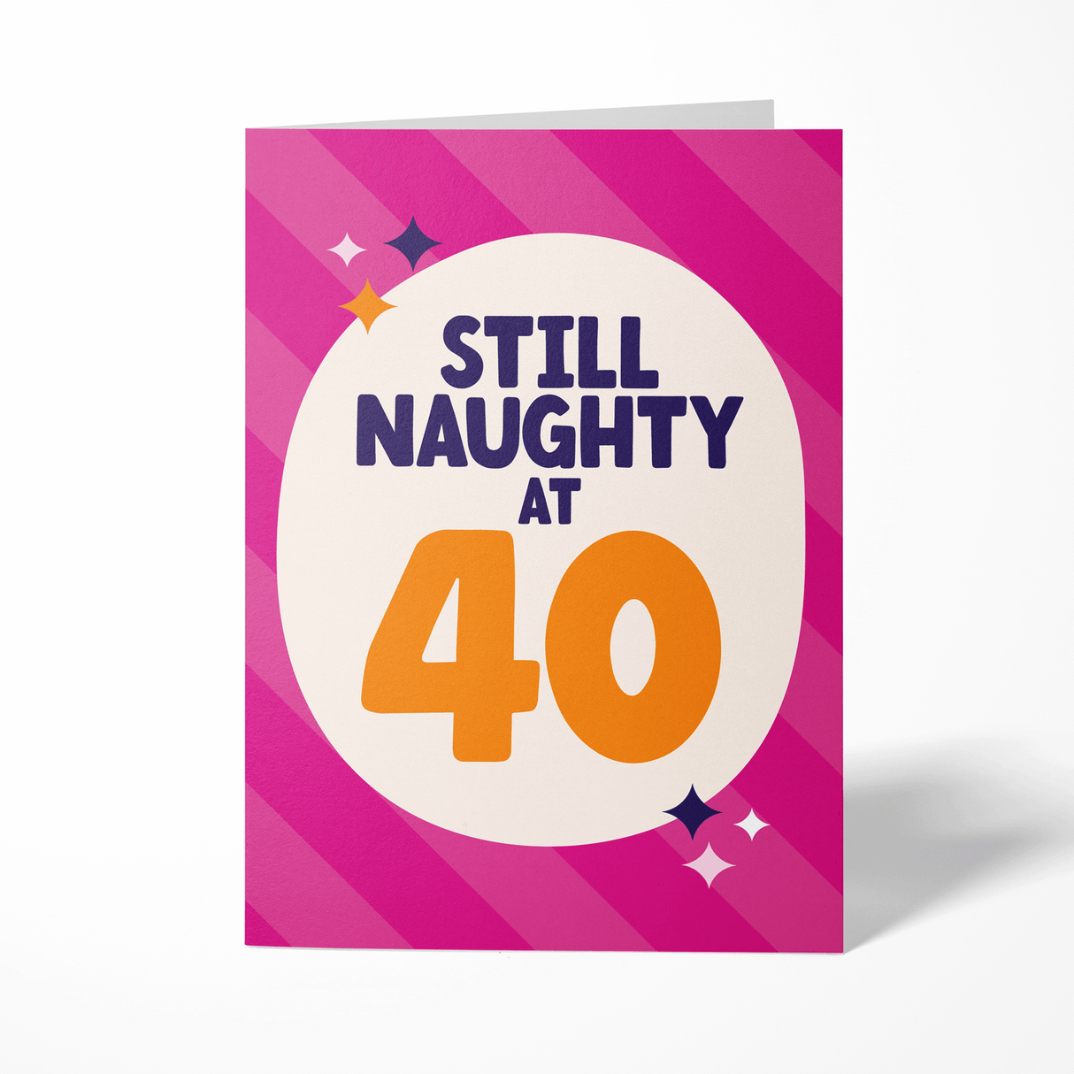 Birthday card with 'Still Naughty at 40' text on a pink background