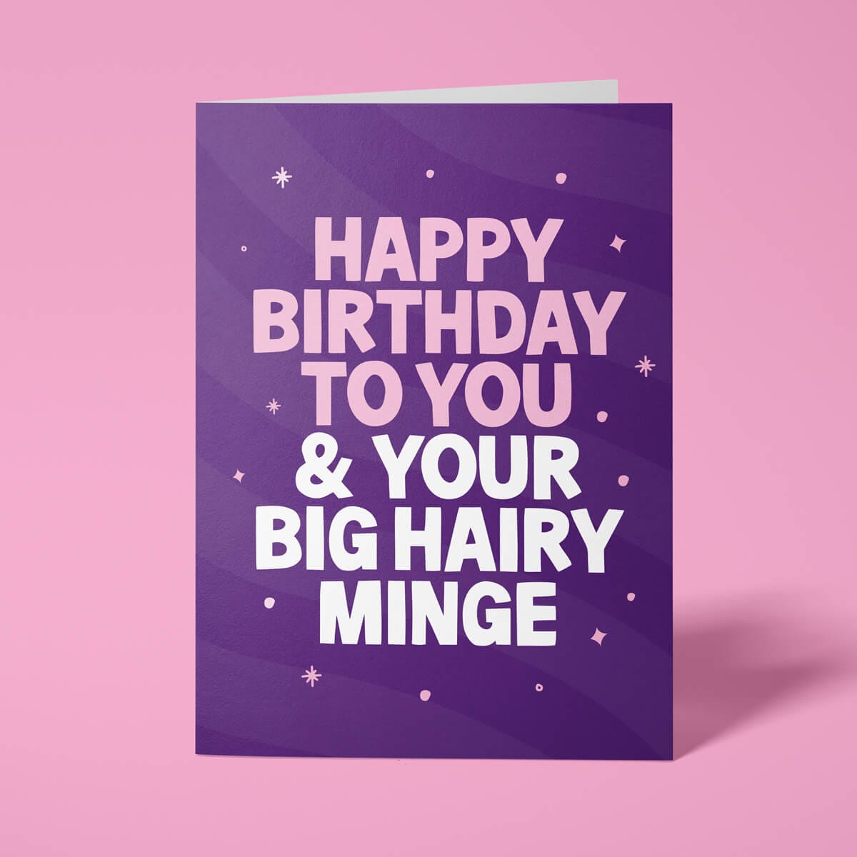 Purple rude birthday card featuring 'Happy Birthday to you & your big hairy minge' message in bold lettering