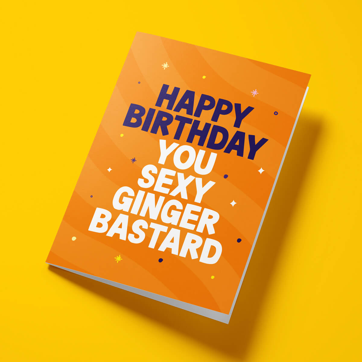 Close-up of the cheeky ginger-themed text on premium gloss card