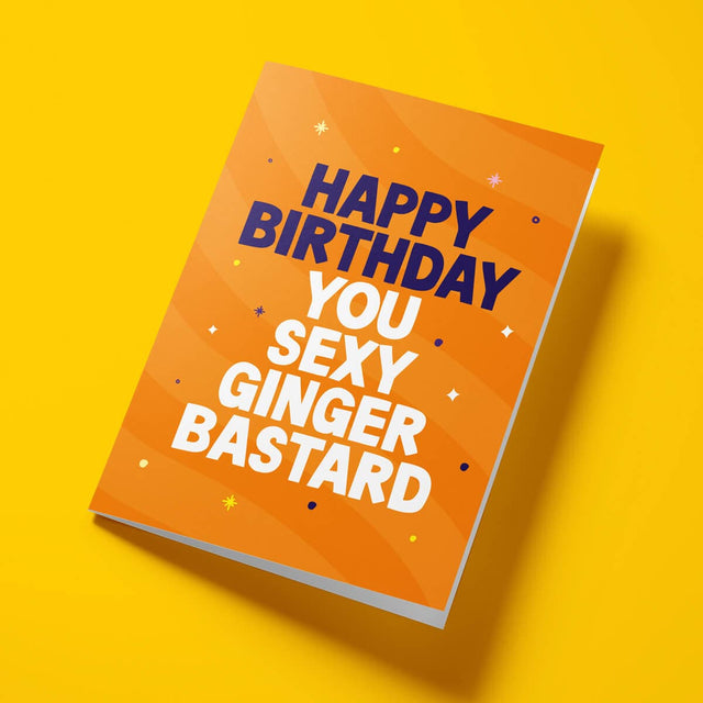 Close-up of the cheeky ginger-themed text on premium gloss card