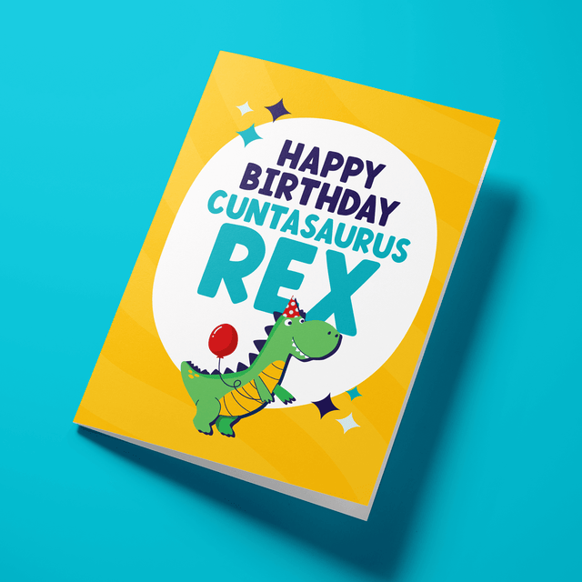 Funny rude birthday card with dinosaur illustration — yellow design, Cuntasaurus Rex bold typography — Wottahoot