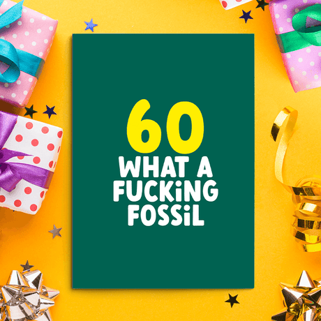 Rude 60th Birthday Card. Image of a rude birthday card with text reading "60 what a fucking fossil"