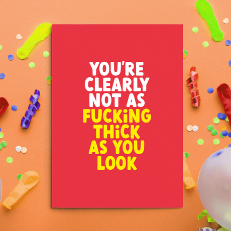 Rude Congratulations Card. Image of a rude card with text reading "You're clearly not as fucking thick as you look"