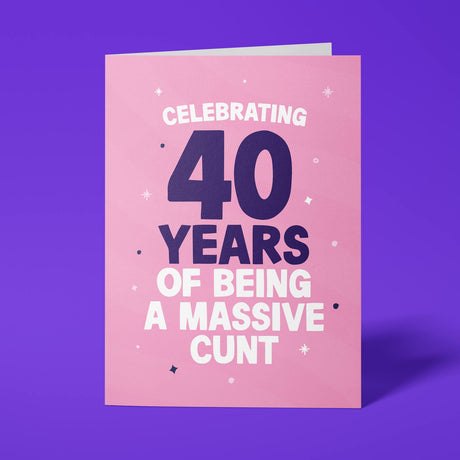 Rude 40th birthday card reading 'Celebrating 40 Years Of Being A Massive Cunt' — pink background with navy number, bold white block text — Wottahoot