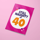 Greeting card with 'Still Naughty at 40' text on a pink background