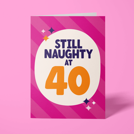 Birthday card with 'Still Naughty at 40' text on a pink background