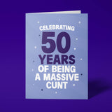 Rude 50th birthday card reading 'Celebrating 50 Years Of Being A Massive Cunt' — pale lilac background with navy number, bold white block text — Wottahoot
