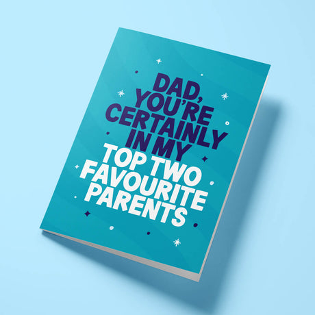 Funny Father's Day card reading 'Dad, You're Certainly In My Top Two Favourite Parents' — teal background, bold block text — Wottahoot