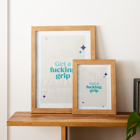 Rude Art Print. Text reads Get a fucking grip. Image shows that the print is available in sizes A4 and A3.