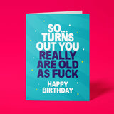Rude birthday card reading So Turns Out You Really Are Old As Fuck on teal background
