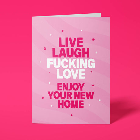 Pink rude new home card with 'Live Laugh Fucking Love. Enjoy your new home' message in bold lettering