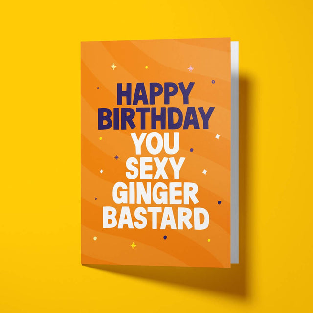 Funny birthday card celebrating attractive redheads with white envelope