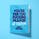 Close-up of the social media joke text on premium gloss card with vibrant blue design