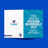 Blue birthday card with humorous text on a blue background