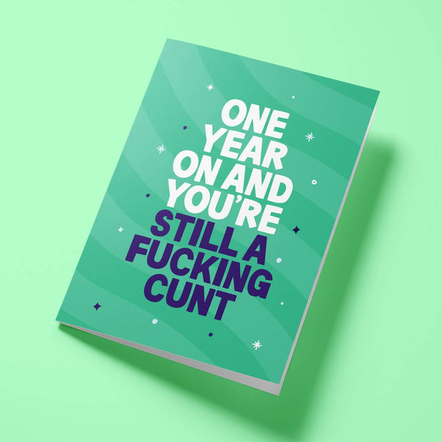 Close-up of the friendship humour text on premium gloss card with green design