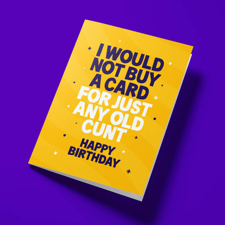 Close-up of the explicit text on premium gloss card with bright yellow design