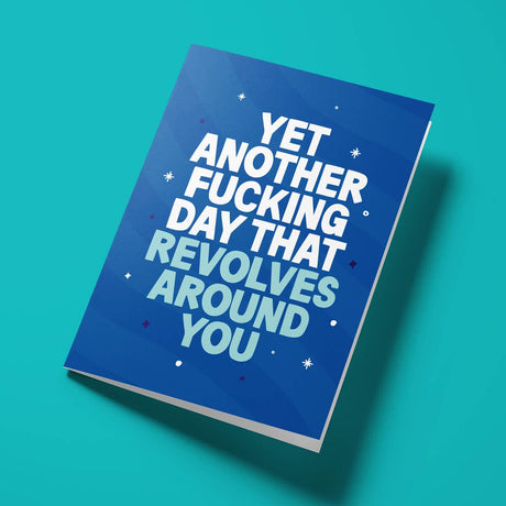 Close-up of the attention-seeking humour text on premium gloss card with blue design