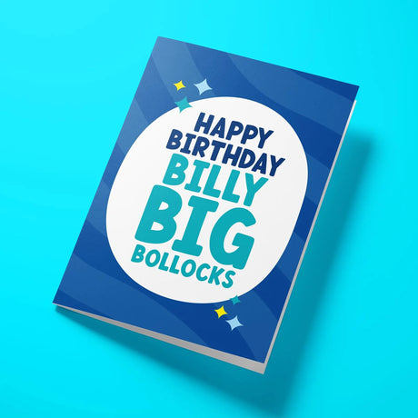 Rude birthday card for him reading 'Happy Birthday Billy Big Bollocks' — navy blue background, bold teal and white block text — Wottahoot